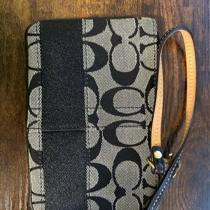 Black and gray coach wristlet